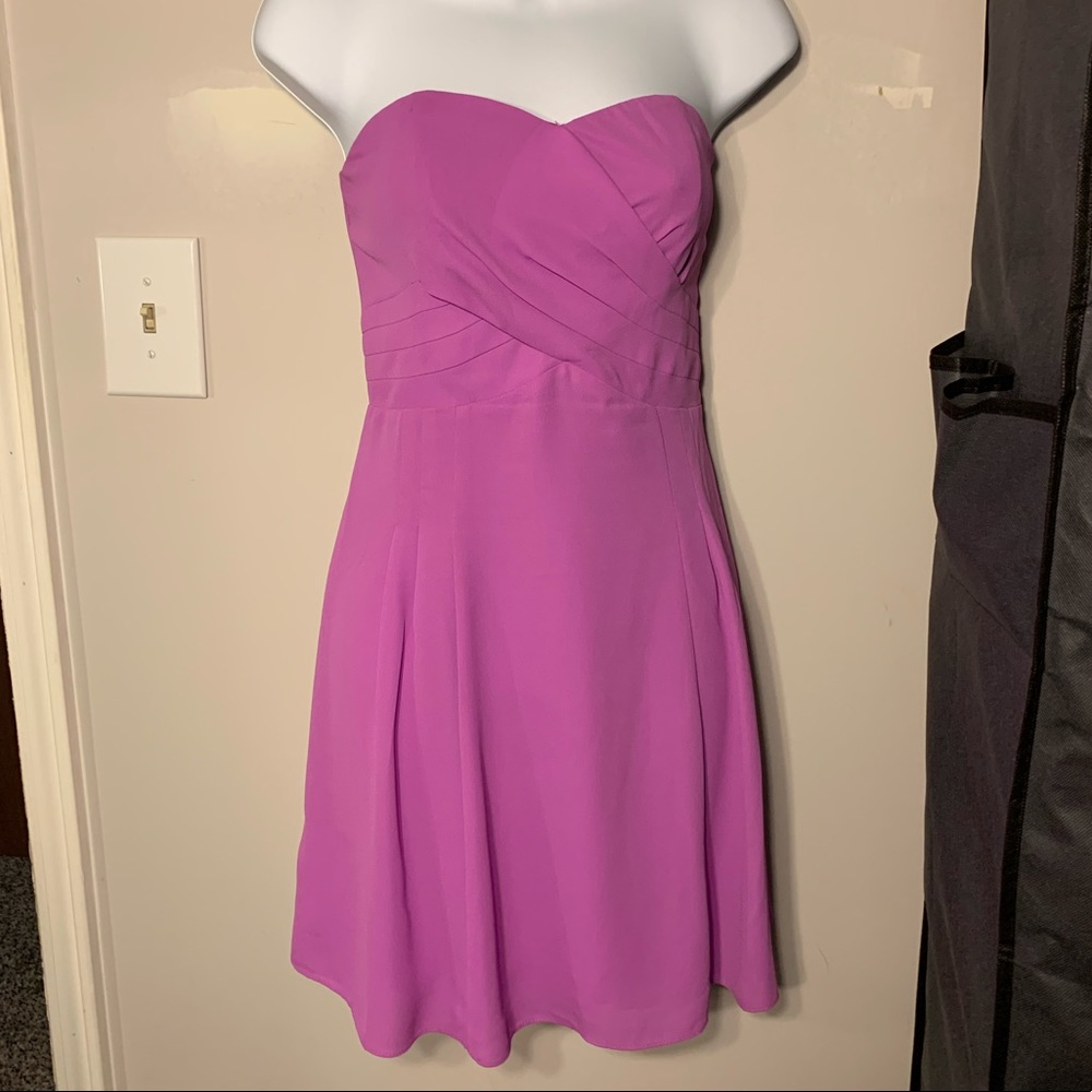 Light purple strapless dress.